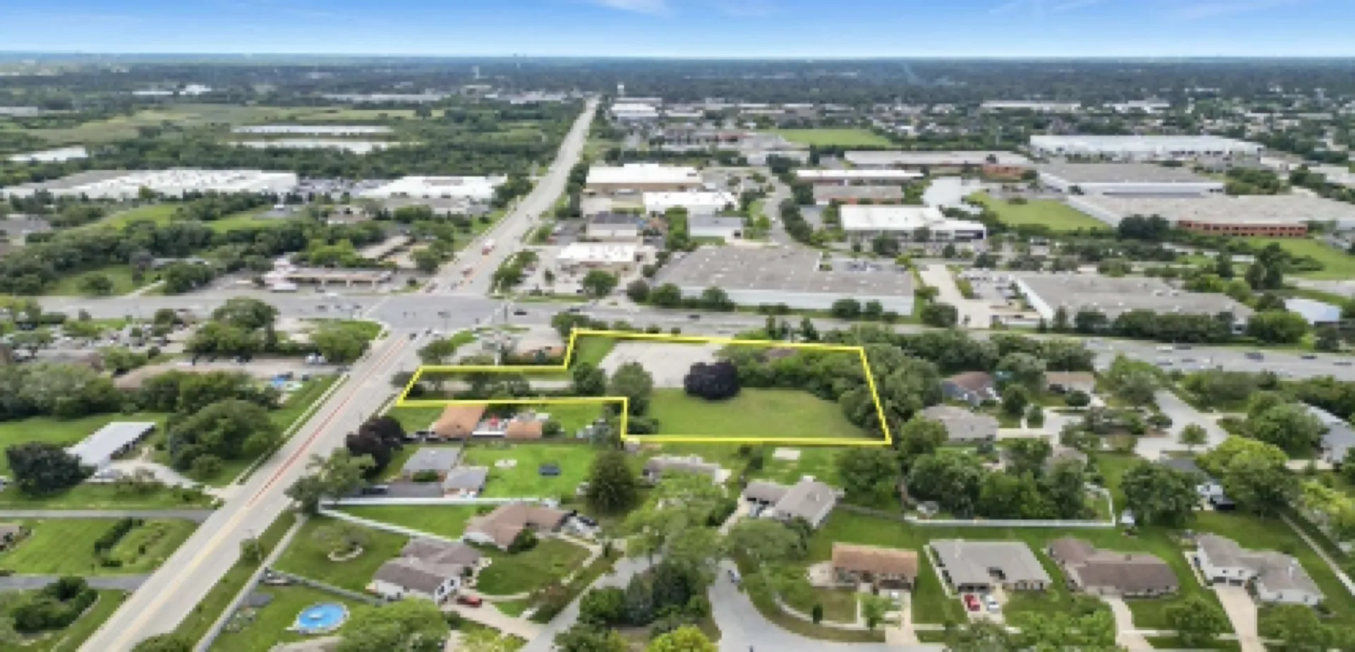 Neighborhood context — wider aerial view